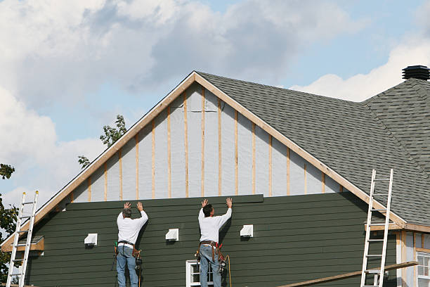Professional Storm Damage Siding Repair technician working in Little Orleans, MD